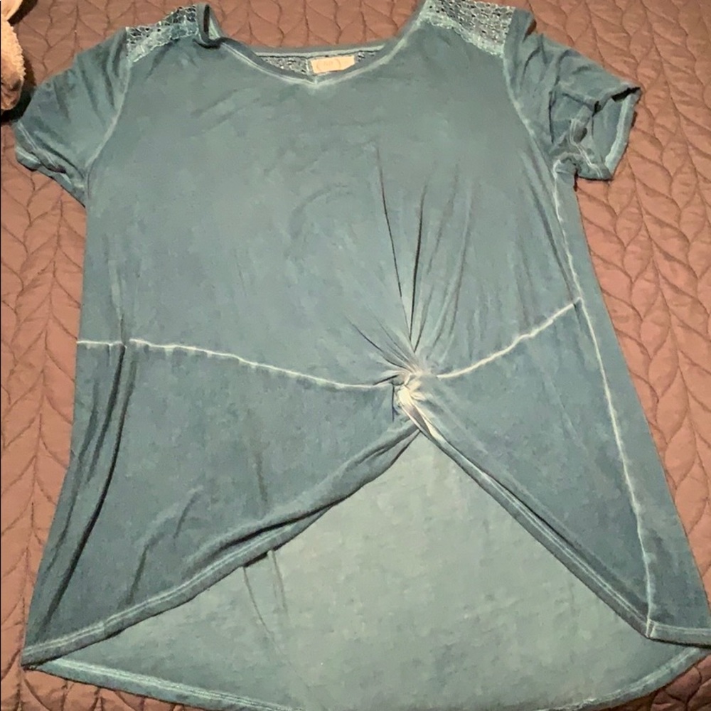 Teal tied T shirt with lace on the top back